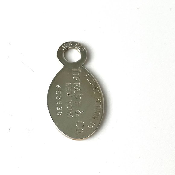 Authentic Tiffany & Co Oval Sterling Silver Return To Tag Charm Pendant